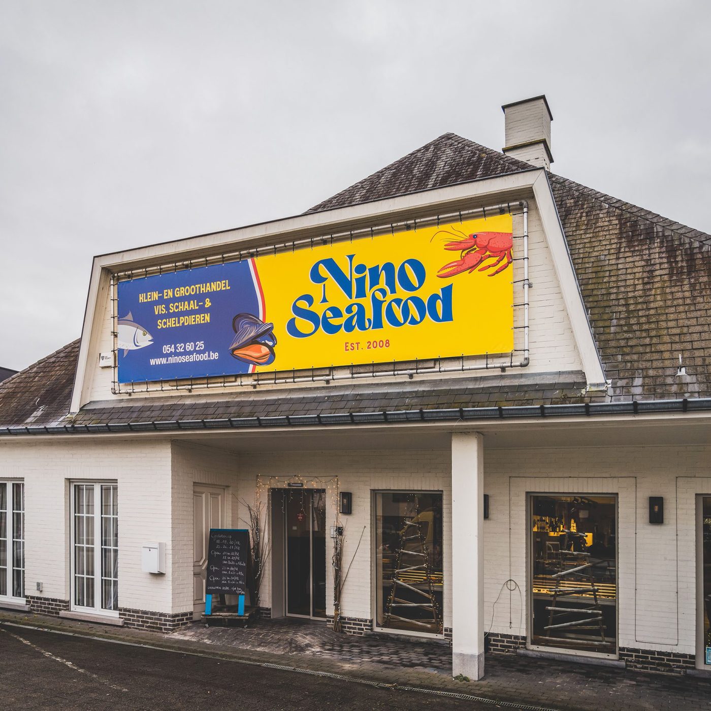 Gevelaankleding voor Nino Seafood door Castaar - Print