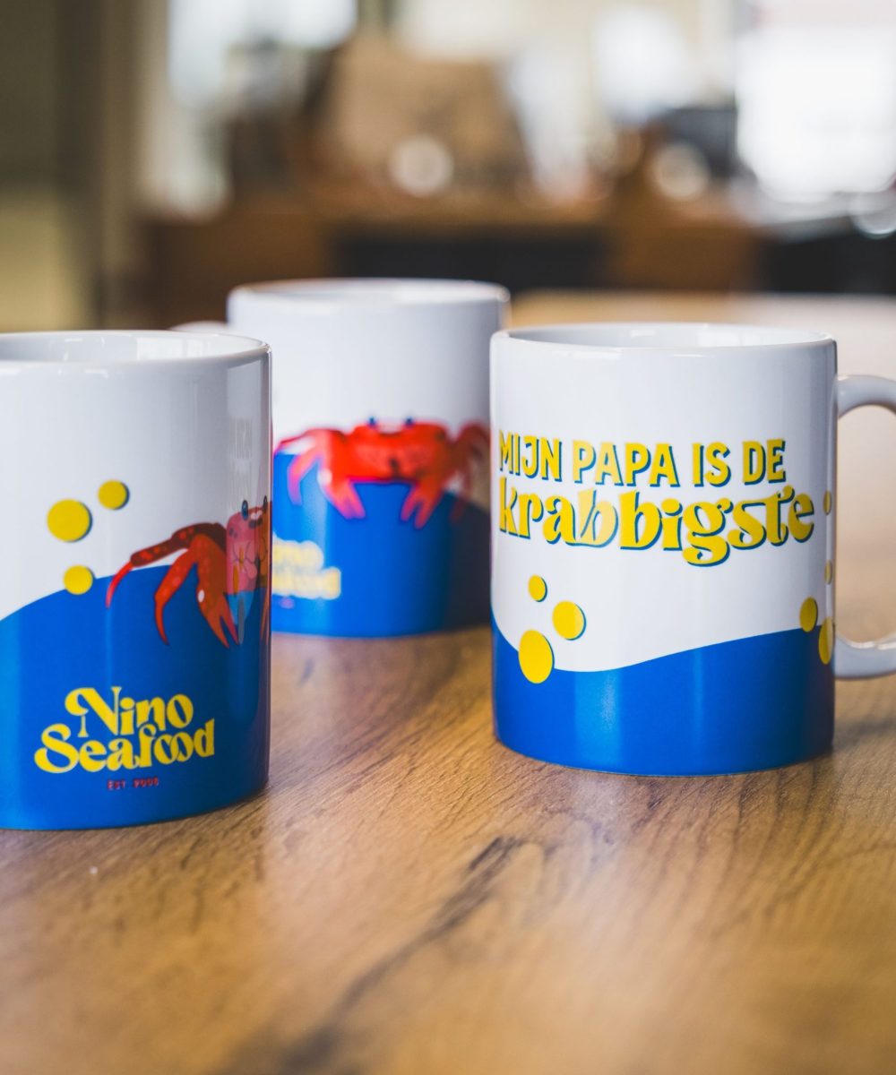 Ontwerp van mokken voor Nino Seafood met nieuw logo door Castaar